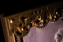 Detail showing how the brass chain connects to the gears