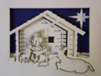 Detail of laser cut nativity scene showing the different layers
