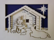Detail of laser cut nativity scene showing the different layers