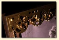 Detail showing how the brass chain connects to the gears