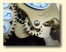 Detail of gears on the steampunk Chronograph pendulum clock 
