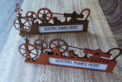 Multi layer metallic steampunk wedding reception table place names