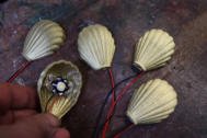 Five of the 3D printed brass coloured LED shell lamps