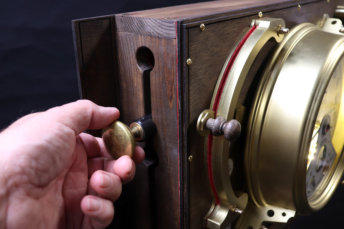 The latching knob mechansim for the the drop down storage box.