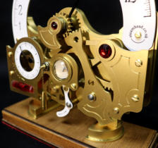The Reciprocating Chronometer's hour display and AM/PM mechanism