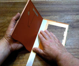 Carefully use the ruler to fold over each of the middle folds