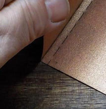 Make sure you fold it in half along the left hand fold mark