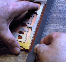 Check and adjust the pocket so it is symmetrical - not slanted, then fold the remaining flap up