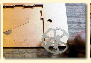 Line up the gear with the hole and markings