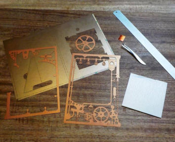 The card cutouts come in two colours. It is suggested using one colour for the pocket and the other colour for the machine cutouts. However, if you have several kits, you can decide how to mix and match