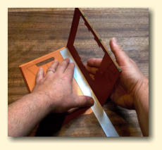 Carefully use the ruler to fold over each of the middle folds