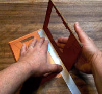 Carefully use the ruler to fold over each of the middle folds