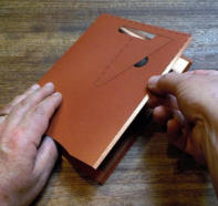 Carefully fold the pocket cutout over onto itself