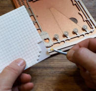 Use the tweezers to peel off the foam pads