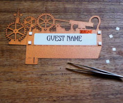 Use the tweezers to peel the backing off each foam pad