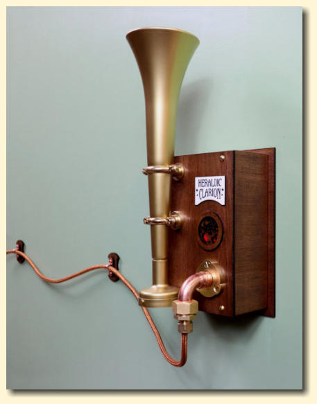The Heraldic Clarion steampunk door horn with ornate cable supports
